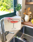 Cocktail Swedish Dishcloth hanging on faucet at a kitchen sink - BESPOKE PROVISIONS